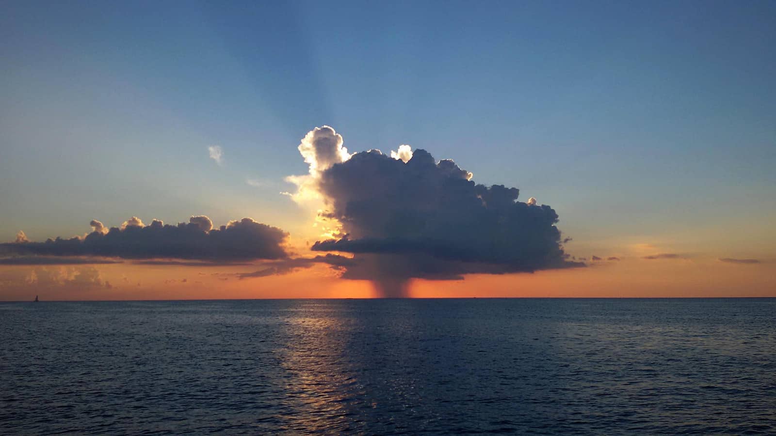 Ibiza catamaran charter, cloud with Rain