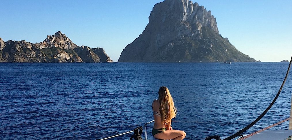 catamaran hire Ibiza - Girl admiring Es Vedra
