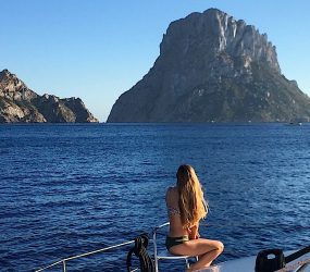 catamaran hire Ibiza - Girl admiring Es Vedra