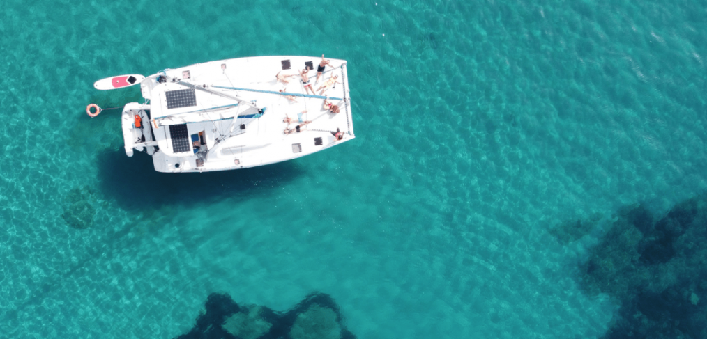 Catamaran Hire Ibiza Formentera. Geronimo From the top in Cala Dhort