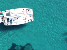 Catamaran Hire Ibiza Formentera. Geronimo From the top in Cala Dhort