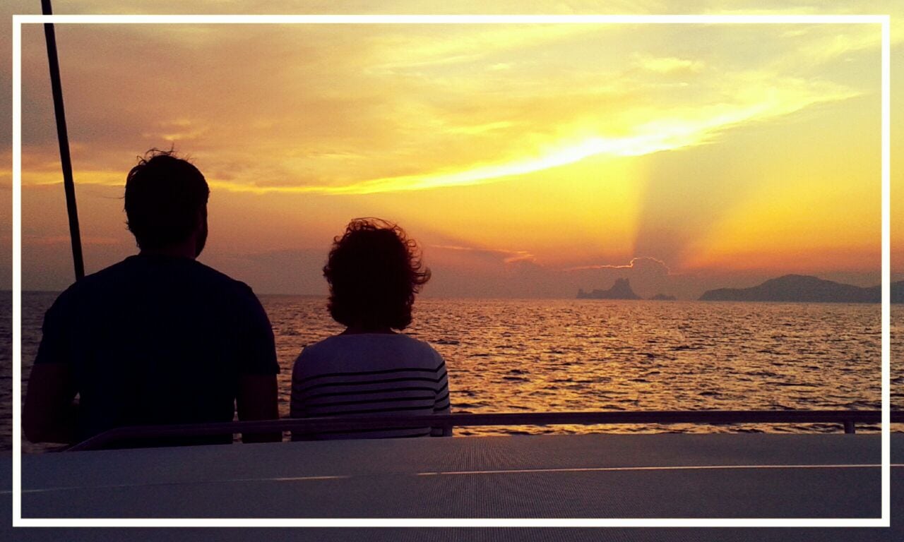 Catamaran Day Hire IBiza, couple enjoying the sunset