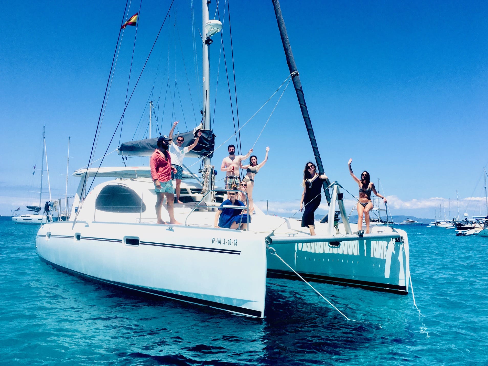 Catamaran Day charter Ibiza, people smiling on Board